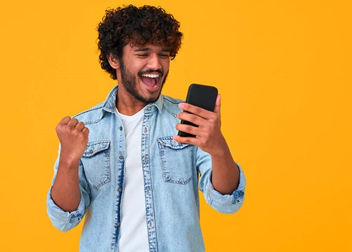 Excited man on the phone