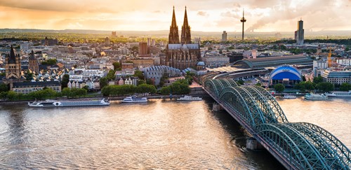 Cityscape of Cologne with bridge over the river and the Dom in the background