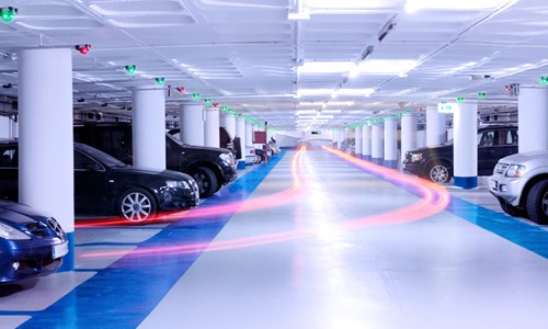 Interior of a parking garage with parking guidance lights