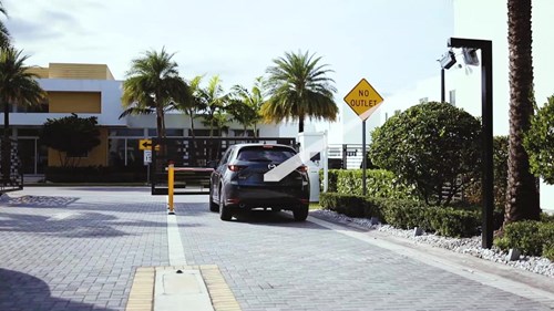 car at a parking gate