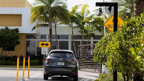 Car next to a gate