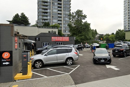 image of cars in a parking lot