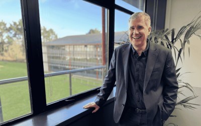 Mark Wilson standing in front of window